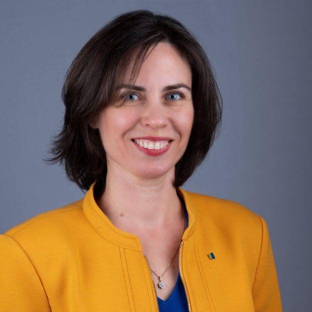 Anastasia headshot Headshot of Ottawa woman business person in yellow jacket brown hair