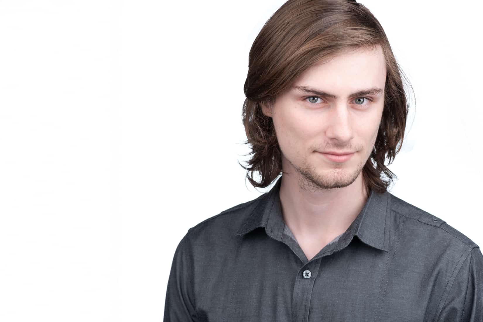 Young man headshot with cool look on a white background headshot in Ottawa