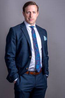 three quarter portrait business person headshot on grey background ottawa